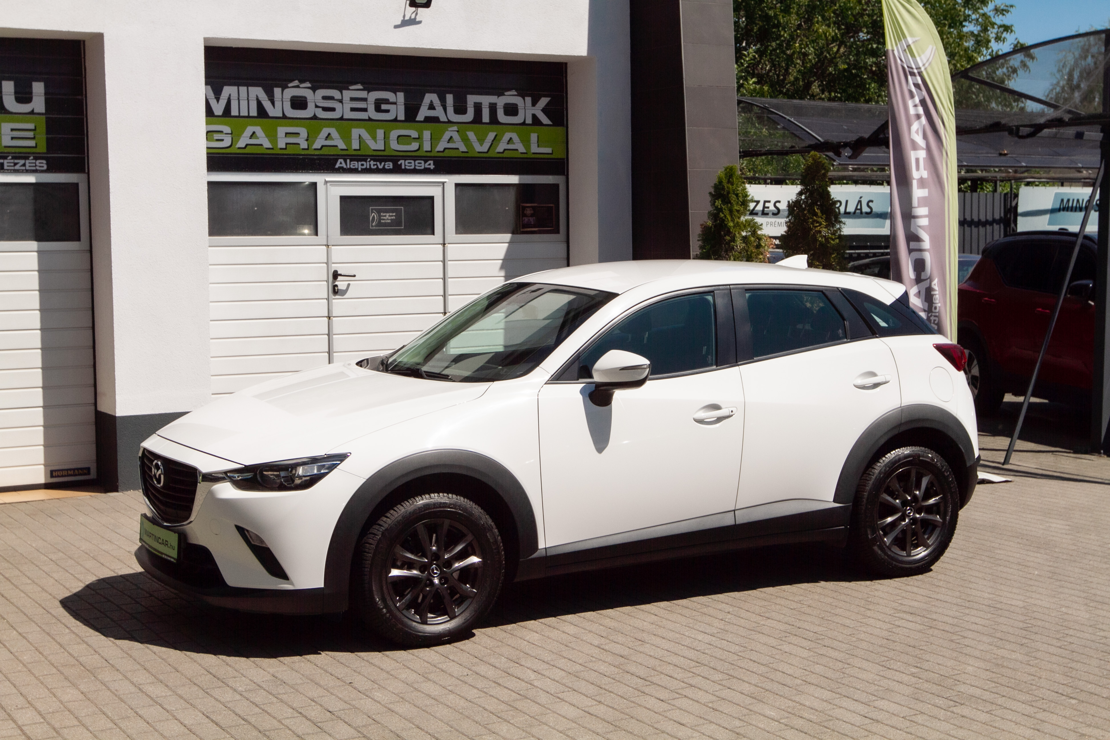 Mazda CX-3 2.0i 88 kW manuál rok 2016, bílá, 120 000 km, Maďarsko — foto 15 z 50
